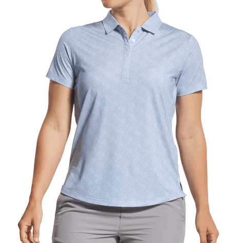 Woman wearing a light blue polo shirt and gray pants on a transparent background